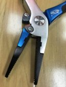 Fishing Pliers Close Up on Teeth